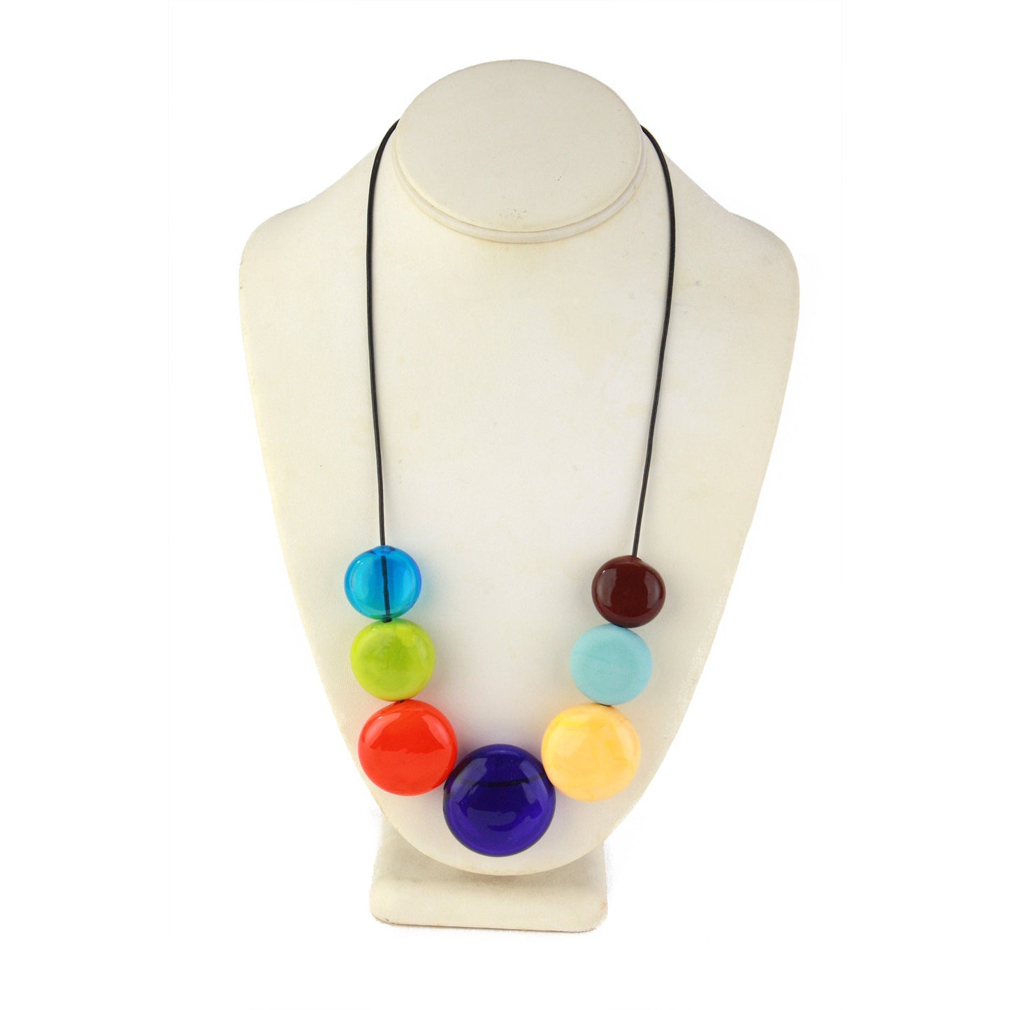 A vibrant necklace featuring seven hollow, hand-blown glass beads in bright multi-colors, strung on adjustable leather for versatile styling options.
