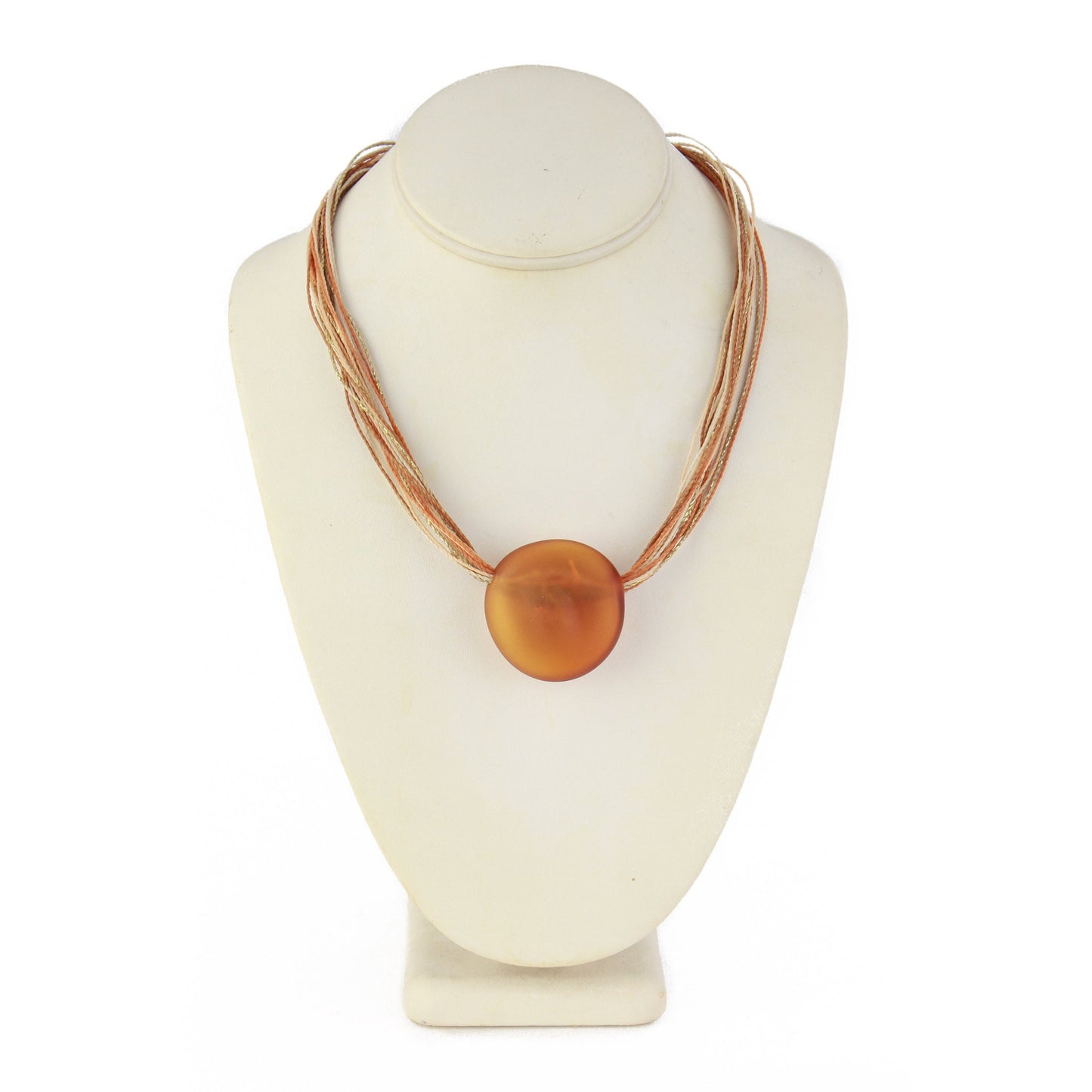 A necklace featuring a hand-blown amber glass focal bead strung on colorful multi-strand waxed cord. Finished with a sterling silver hook-and-loop clasp, this elegant piece combines warm tones with artisanal craftsmanship.