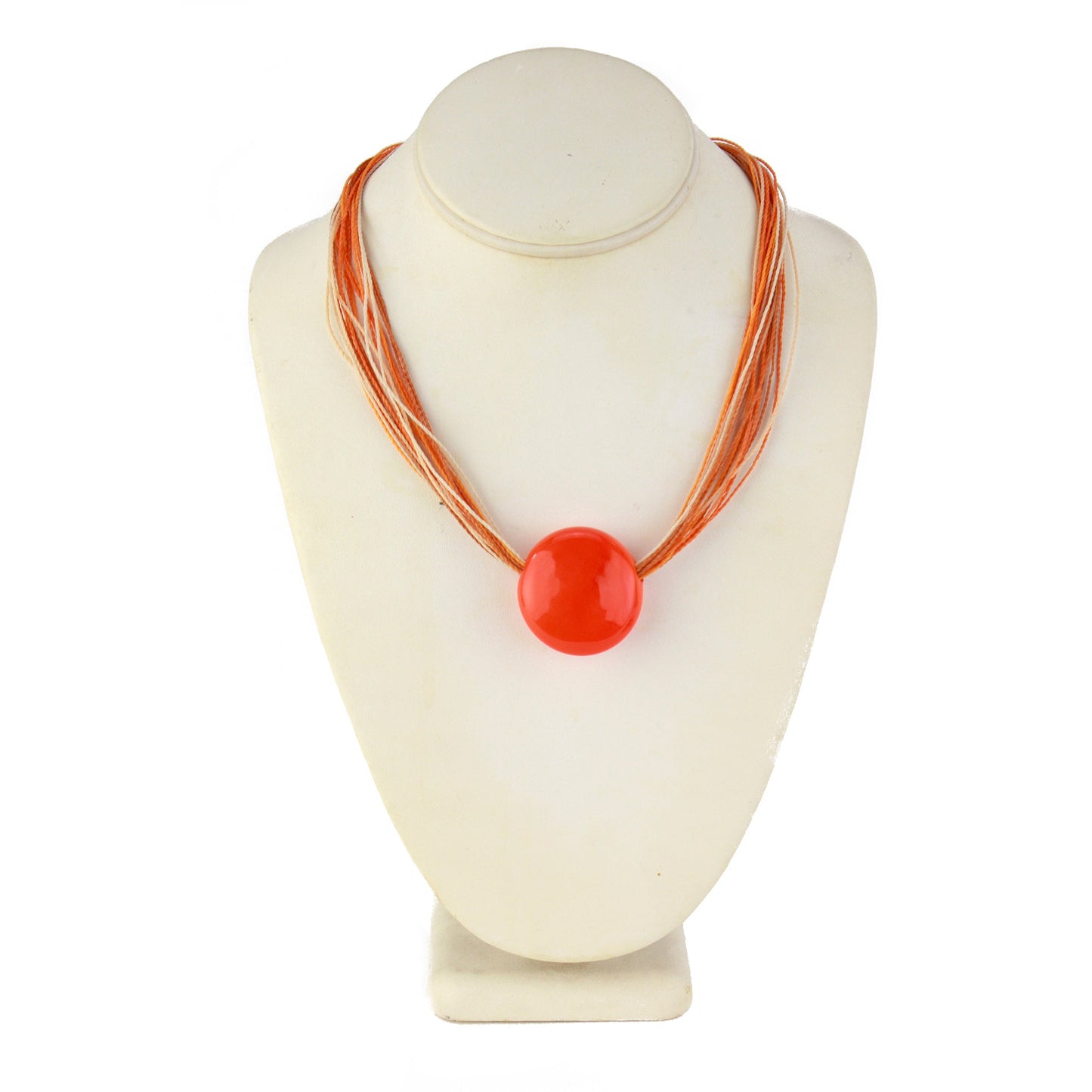 A bold necklace featuring a hand-blown orange glass focal bead strung on multi-strand waxed cord in vibrant shades of orange, cream, and beige. Finished with a sterling silver hook-and-loop clasp, this piece adds a pop of bright color to any outfit.