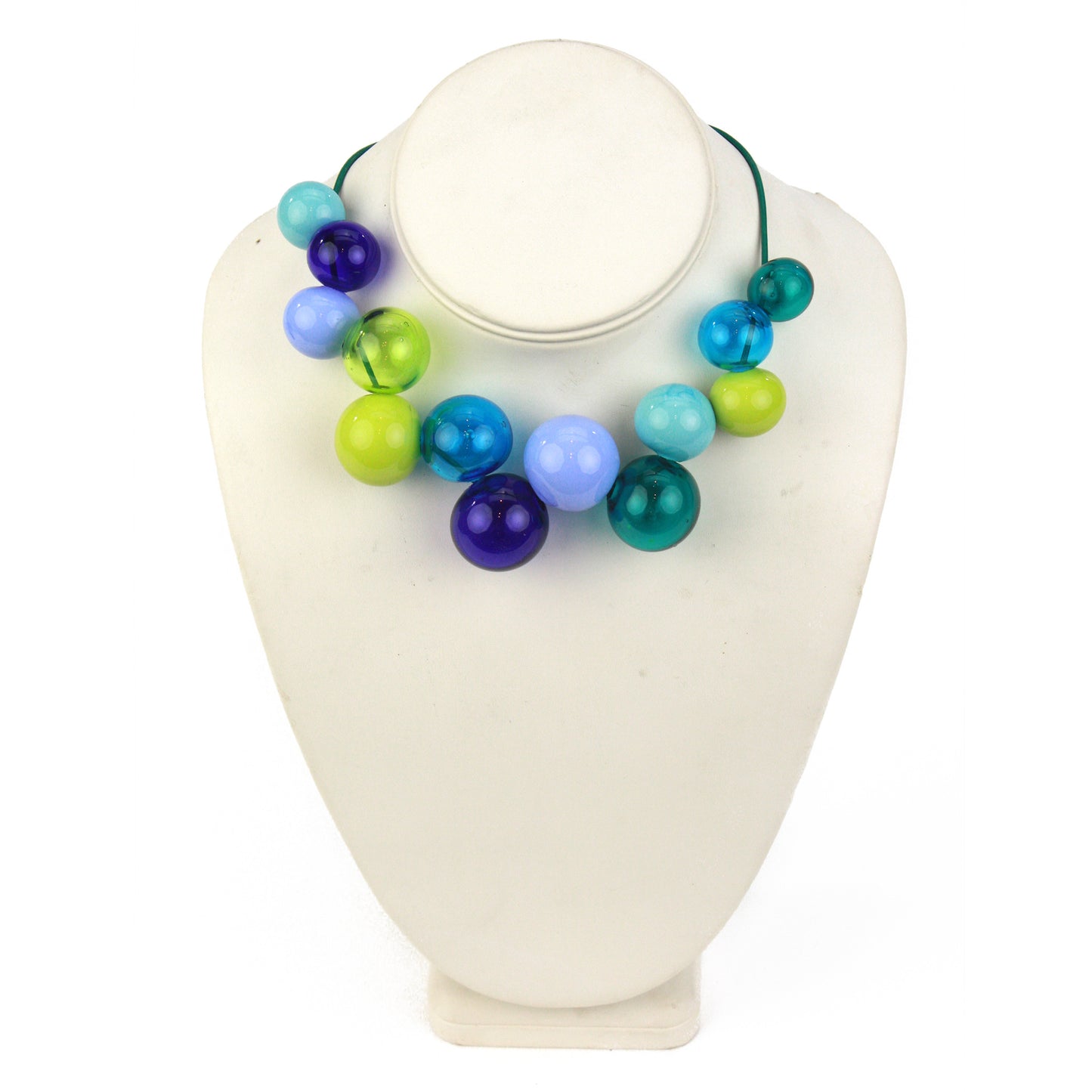 Hand-blown glass bead Offset Bolla Necklace in vivid blue, teal, and green hues. Adjustable length from 36" to choker on fine green leather. Bold and stylish!