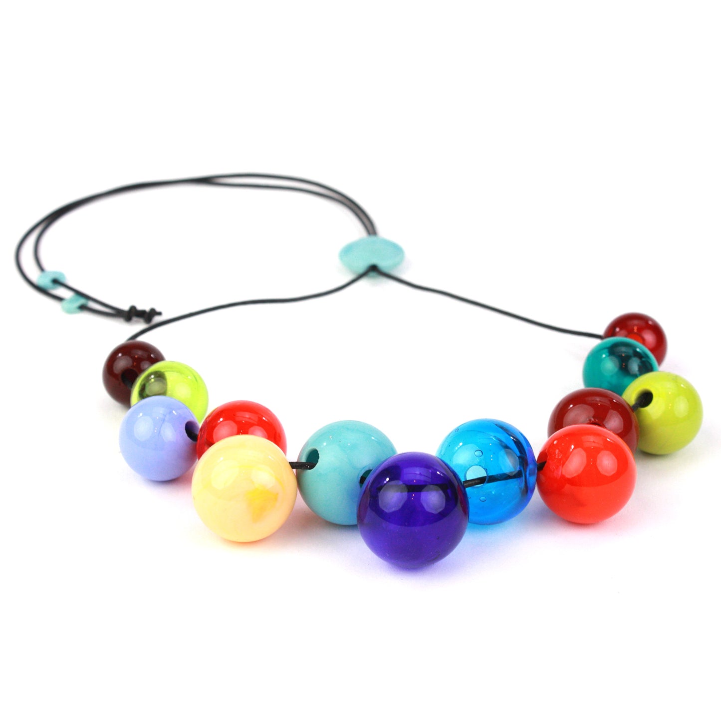 Bright Offset Bolla Necklace with hand-blown glass beads in vivid rainbow colors. Adjustable length from 36" to choker on black leather cord. Bold and playful style!
