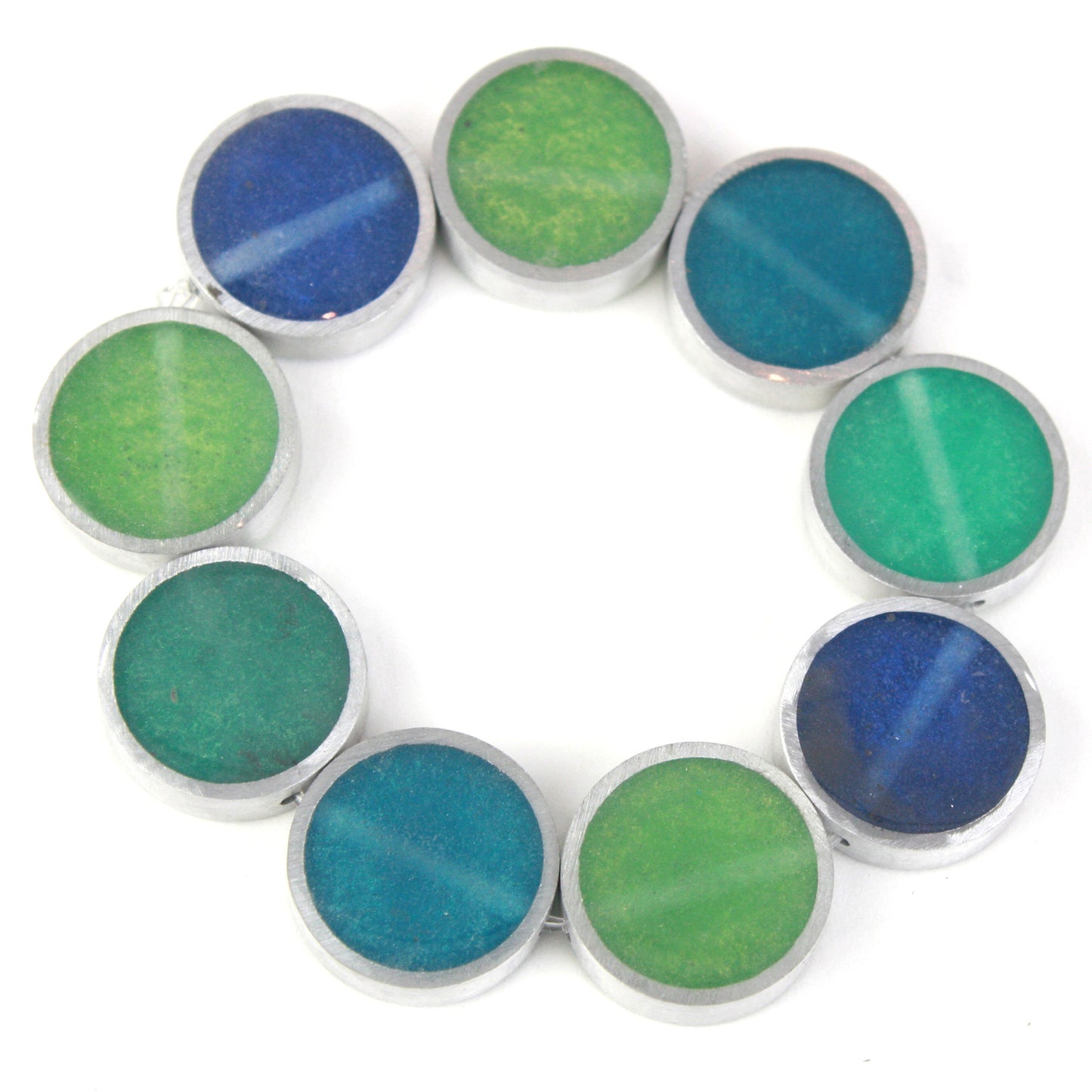 Resinique Single Circle Bracelet with a vibrant mix of blue and green eco-resin discs set in salvaged aluminum, strung on elastic for comfort and style.