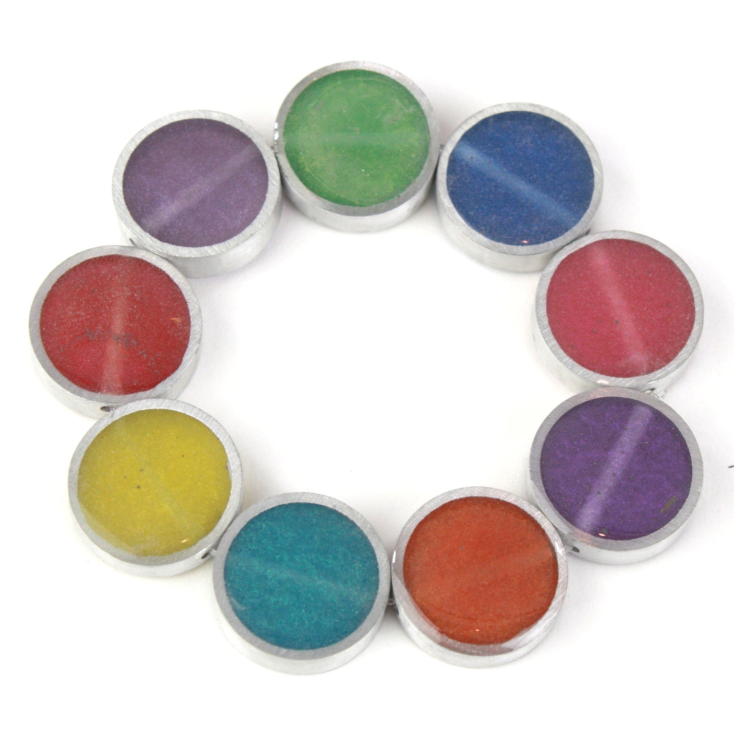 Resinique Rainbow Circle Bracelet featuring multicolored eco-resin discs (red, orange, yellow, green, blue, purple) set in salvaged aluminum, strung on elastic.