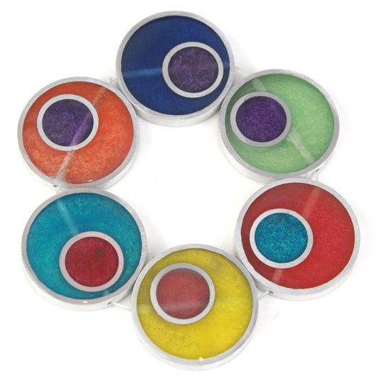 Resinique Double Circle Bracelet with rainbow-colored eco-resin designs layered in salvaged aluminum circles, strung on a comfortable elastic band.