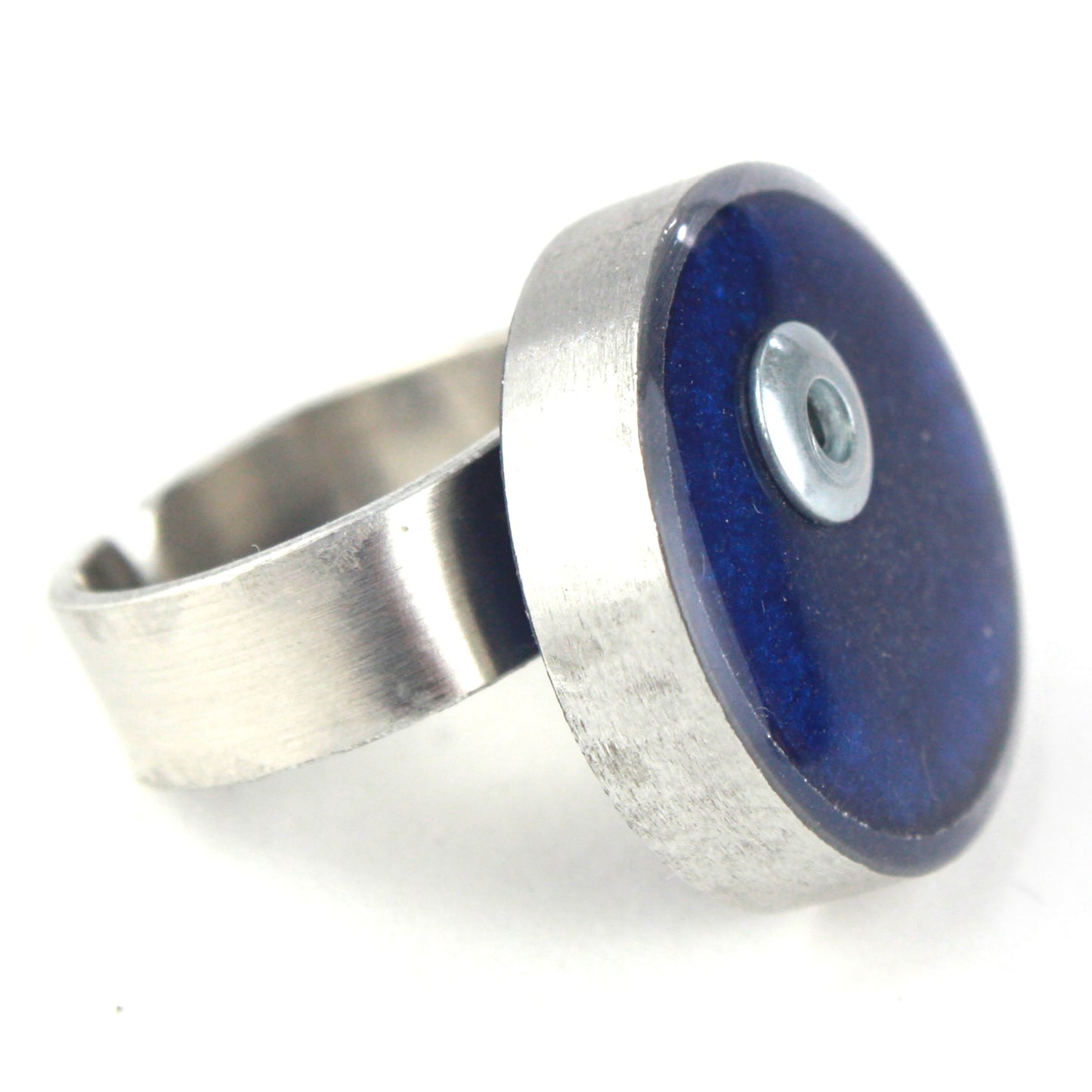 Dark blue Resinique Single Circle Ring featuring a salvaged aluminum setting and fully adjustable aluminum band.