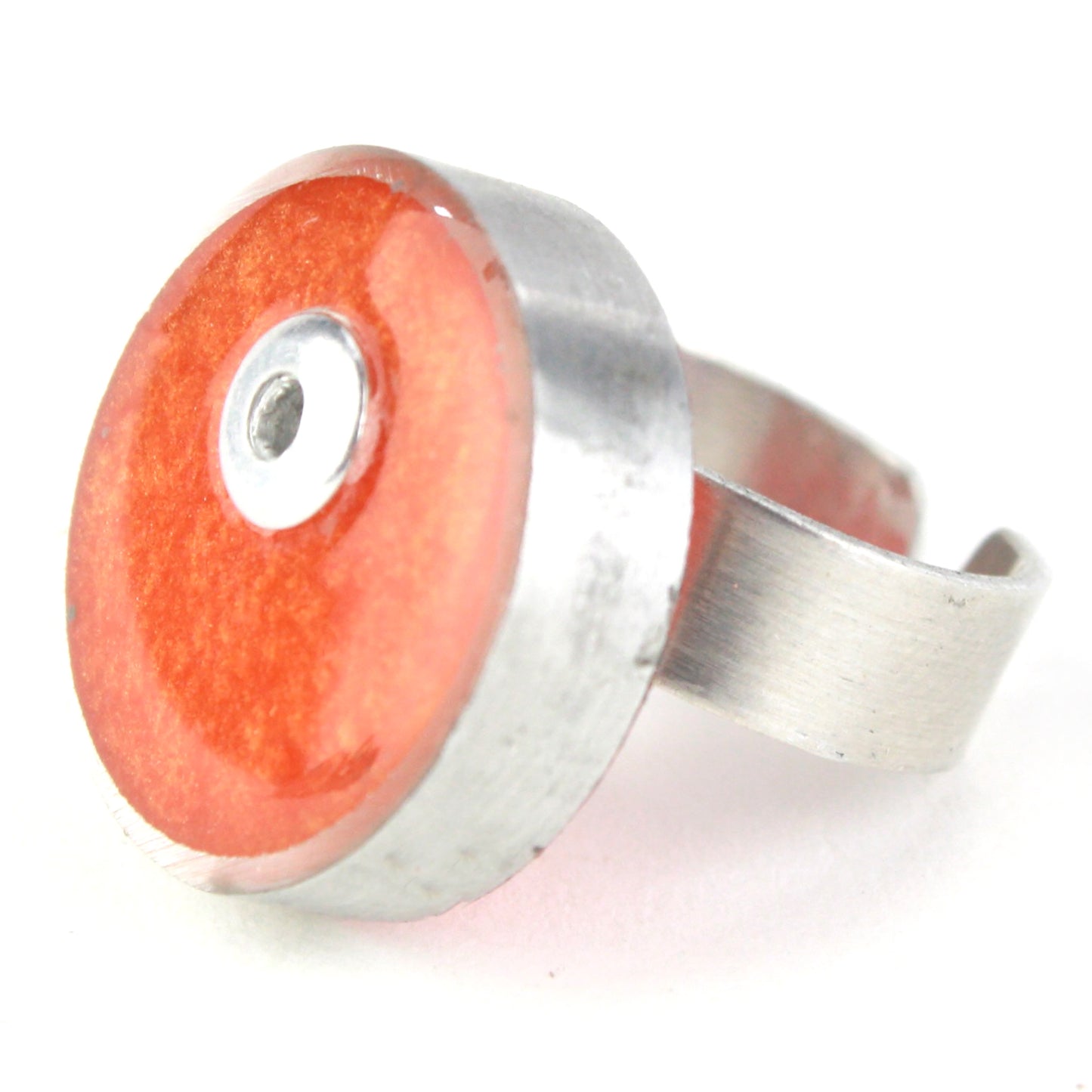Orange Resinique Single Circle Ring with a vivid eco-resin centerpiece in a salvaged aluminum setting and an adjustable band for a comfortable fit.