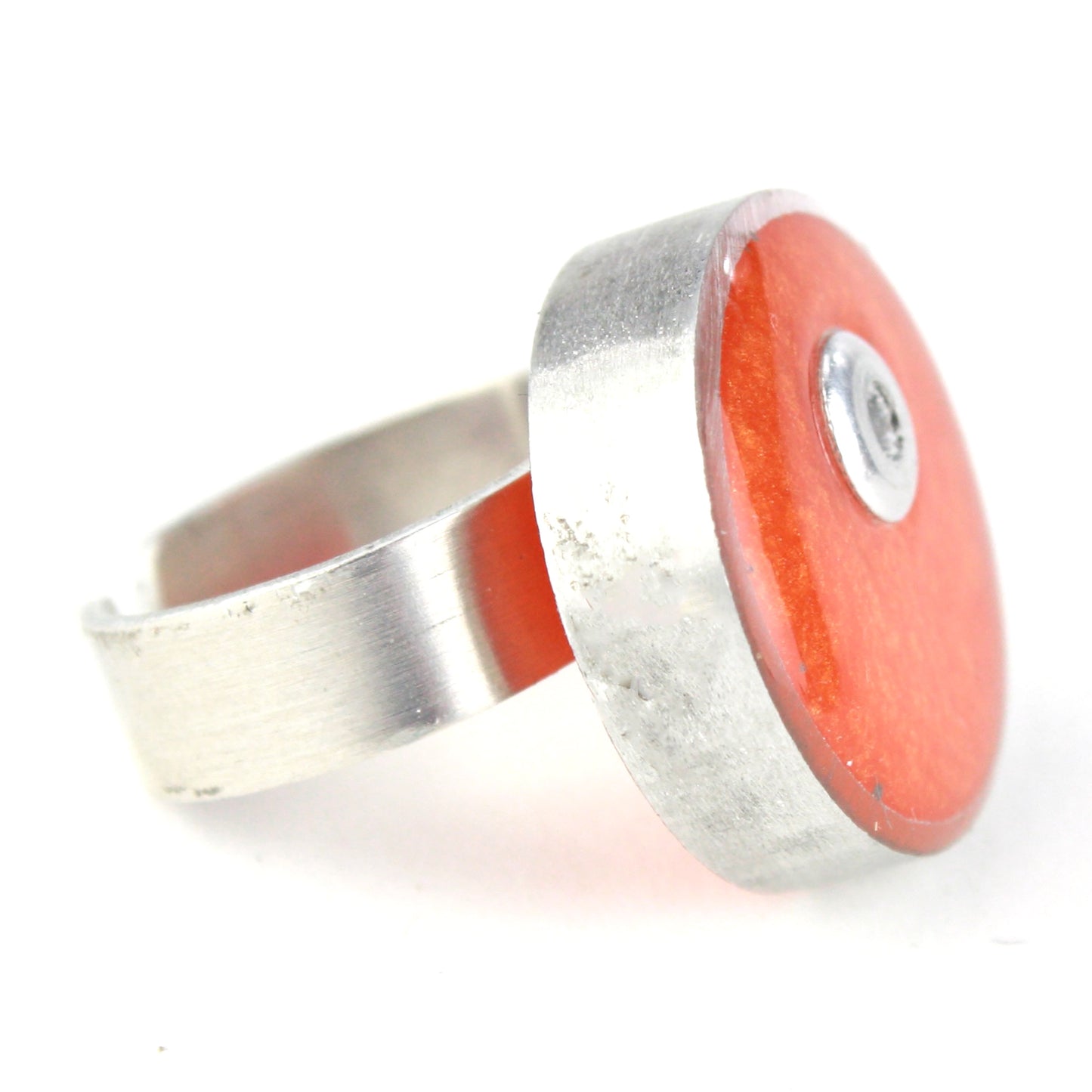 Orange Resinique Single Circle Ring with a vivid eco-resin centerpiece in a salvaged aluminum setting and an adjustable band for a comfortable fit.