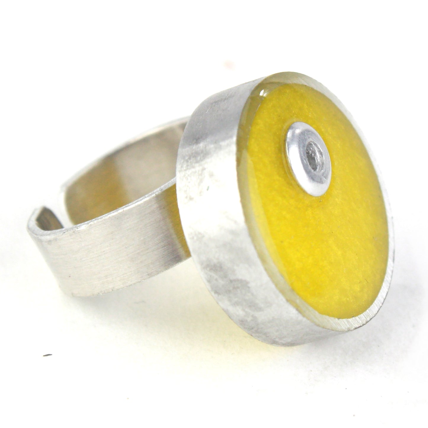 Yellow Resinique Single Circle Ring with a vibrant eco-resin centerpiece set in salvaged aluminum and an adjustable band.