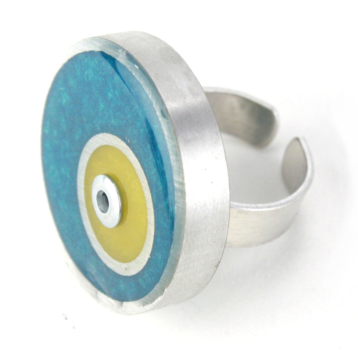 Teal and yellow Resinique Double Circle Ring crafted with eco-resin and salvaged aluminum, featuring a fully adjustable band for stylish comfort.