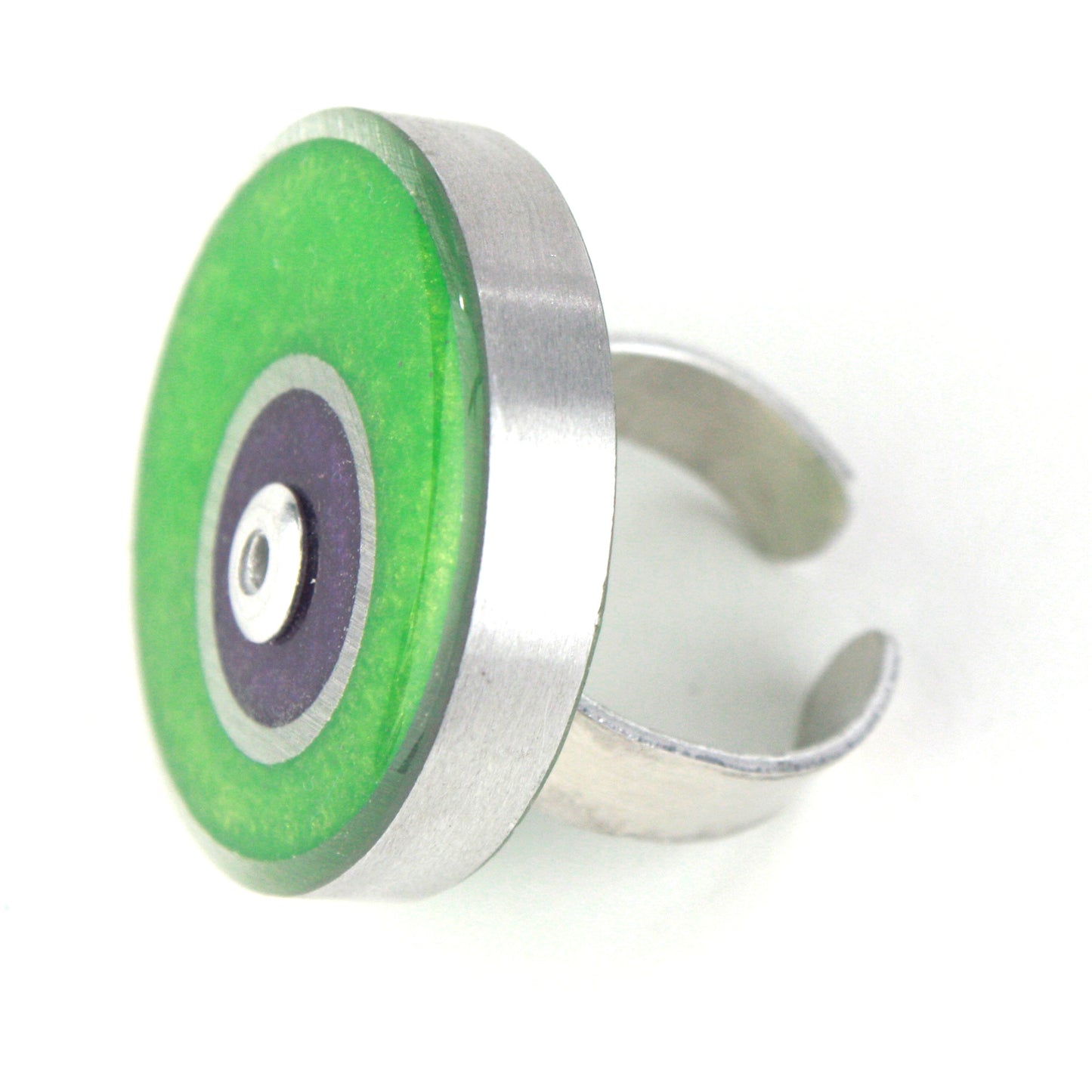 Green and purple Resinique Double Circle Ring with eco-resin and salvaged aluminum, featuring an adjustable band for a bold, eco-conscious statement.