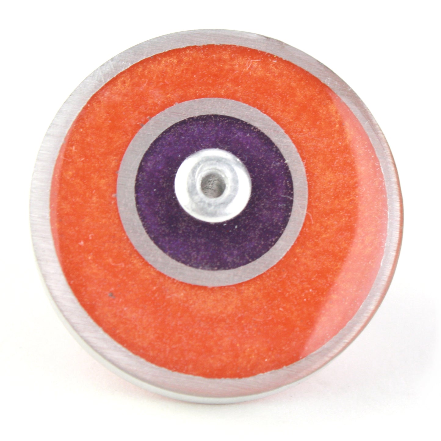 Orange and purple Resinique Double Circle Ring made from eco-resin and salvaged aluminum, featuring an adjustable band for a unique and sustainable accessory.