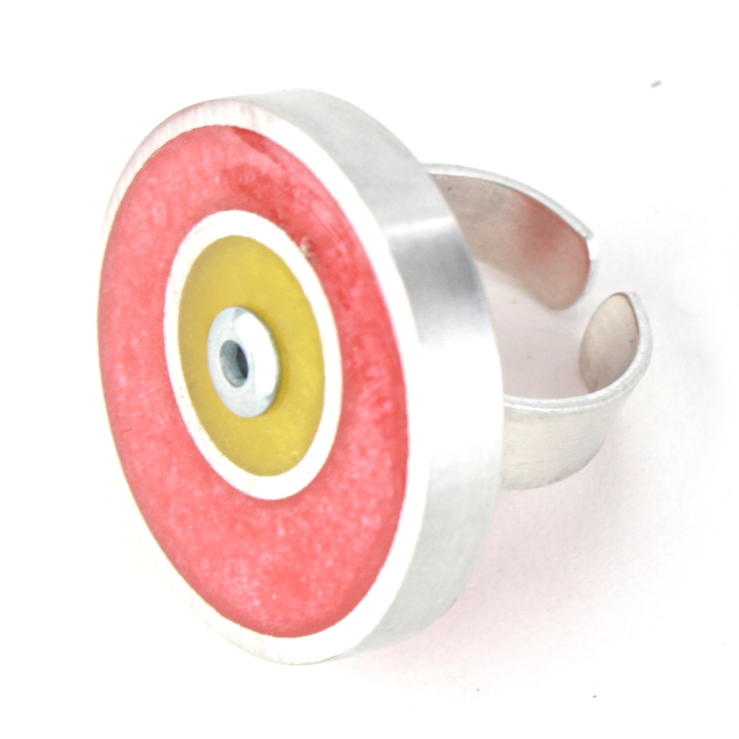 Pink and yellow Resinique Double Circle Ring with eco-resin and salvaged aluminum, featuring a fully adjustable band for playful, sustainable style.