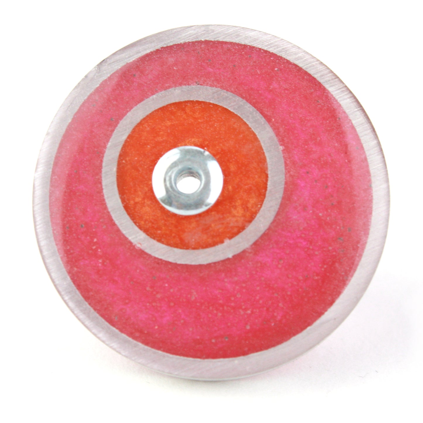 Bright pink and orange double circle ring made from salvaged aluminum and eco-resin with an adjustable band.