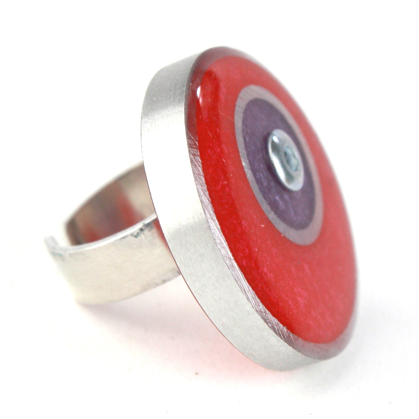 Bright red and purple double circle ring made from salvaged aluminum and eco-resin with an adjustable band.