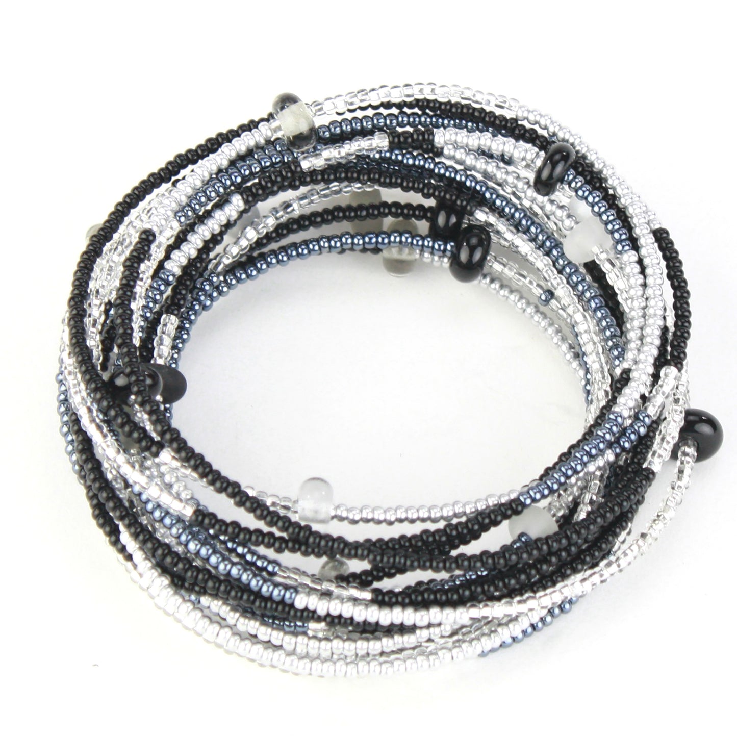 A 12-foot necklace made of black, white, and silver glass seed beads with handcrafted accents, styled here as a wrap bracelet. Its versatile design allows it to be worn as a long necklace, layered, or wrapped around the wrist for a bold bracelet look.
