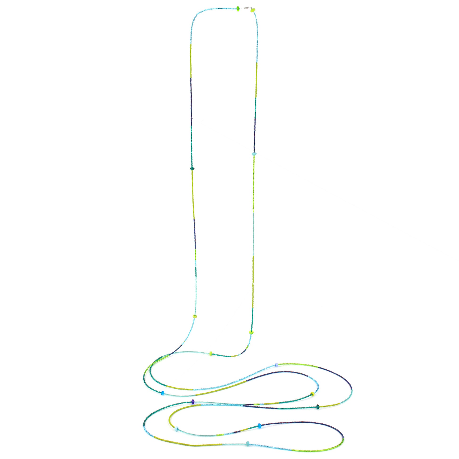 A vibrant 12-foot necklace made of glass seed beads in shades of green, blue, and teal, accented with handcrafted lampworked glass beads. The necklace features a versatile design with a secure barrel screw clasp, perfect for layering or wearing long for a bold, colorful statement.