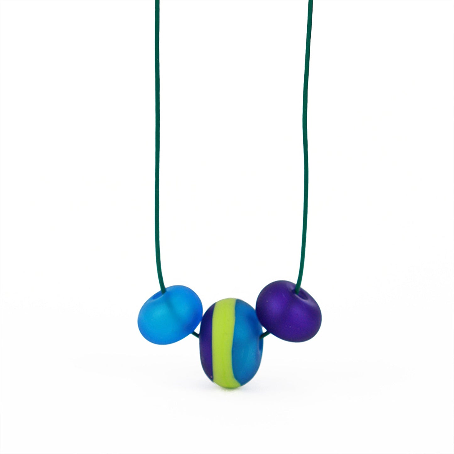 Soft Stripes Necklace with three hand-blown sandblasted glass beads in turquoise, cobalt, and green accents, on an adjustable fine leather cord.