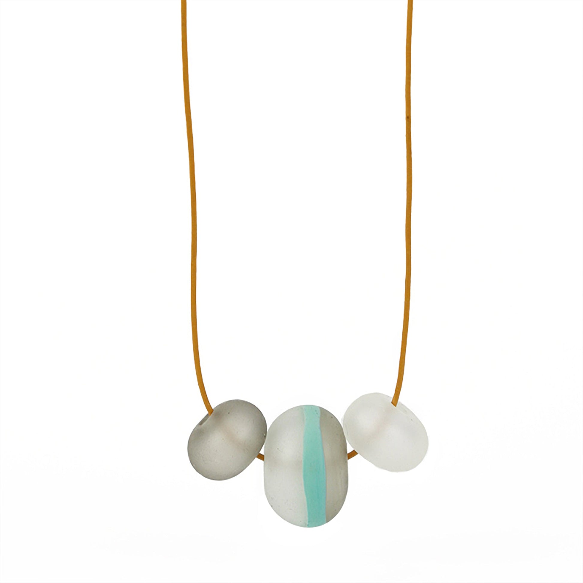 Soft Stripes Necklace with three hand-blown sandblasted glass beads in white, grey, and blue accents, strung on a mustard adjustable fine leather cord.