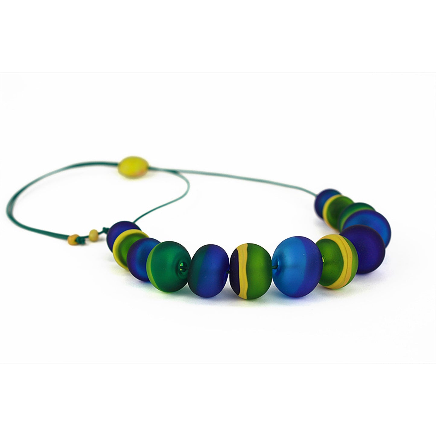 Soft Stripes Necklace with hand-blown, sandblasted turquoise glass beads accented by green and yellow, strung on an adjustable fine leather cord.