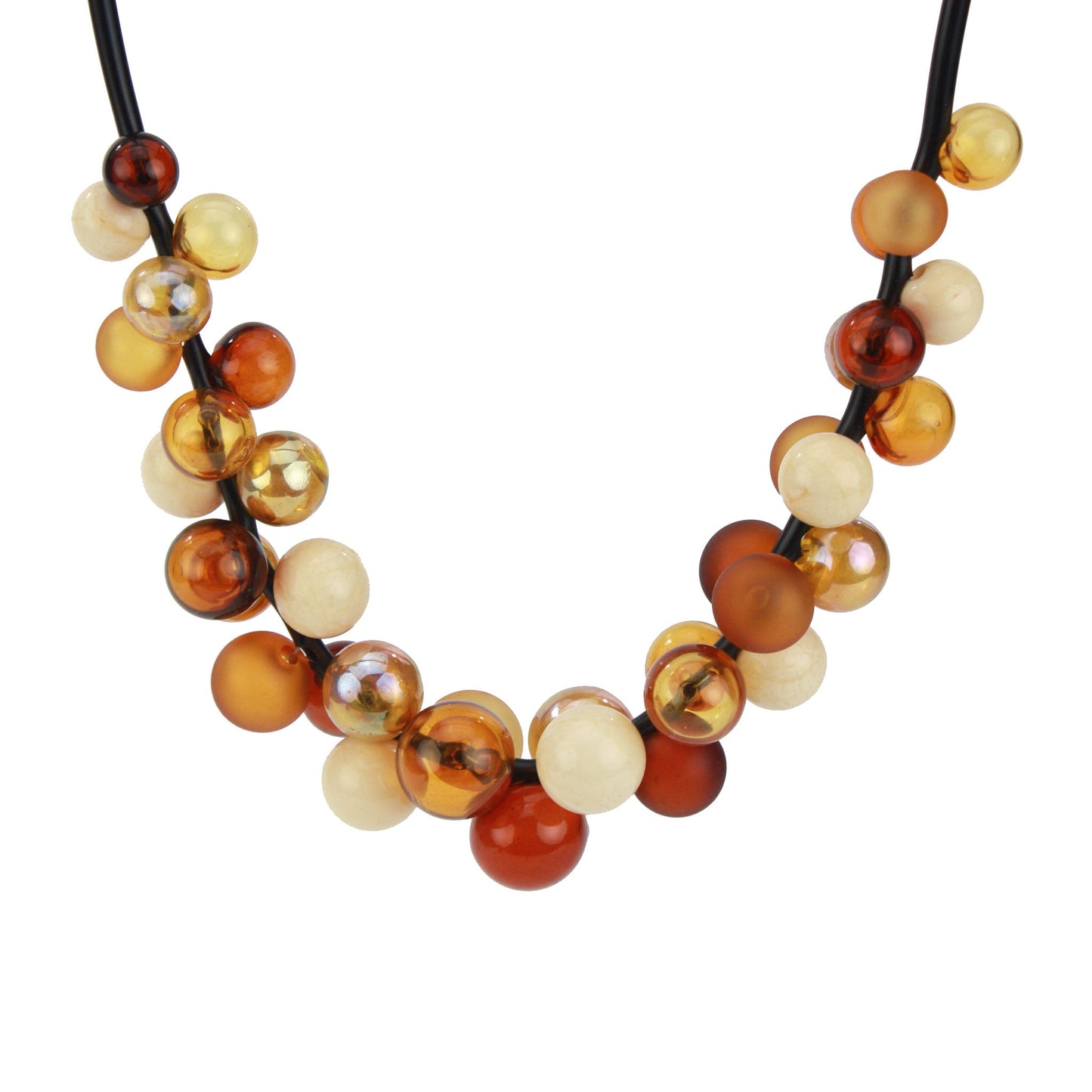 A bold statement necklace featuring hand-blown glass beads in warm shades of amber, gold, cream, and bronze, strung on steel cable through a rubber cord with a sterling silver clasp.