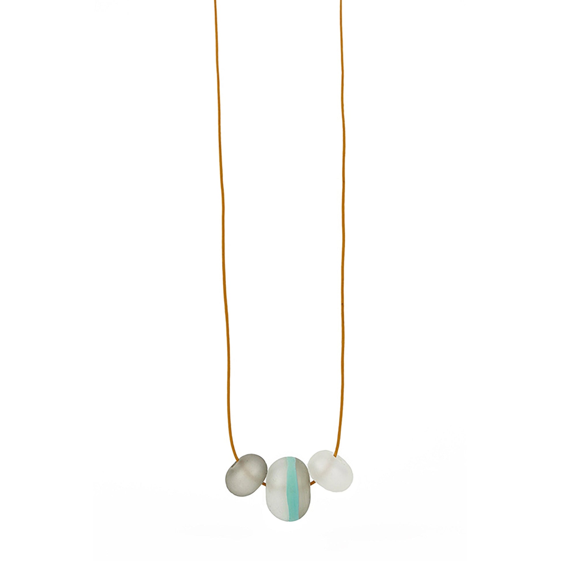 Soft Stripes Necklace with three hand-blown sandblasted glass beads in white, grey, and blue accents, strung on a mustard adjustable fine leather cord.