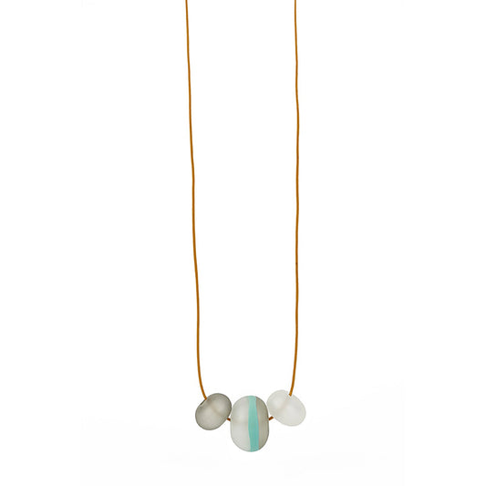 Soft Stripes Necklace with three hand-blown sandblasted glass beads in white, grey, and blue accents, strung on a mustard adjustable fine leather cord.