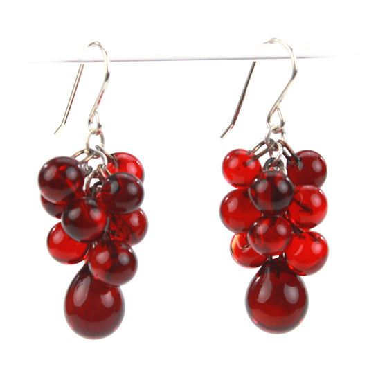 Ruby Red Glass Cluster Earrings with cascading glass beads and teardrop accents, paired with sterling silver ear wires for a vibrant, elegant statement.
