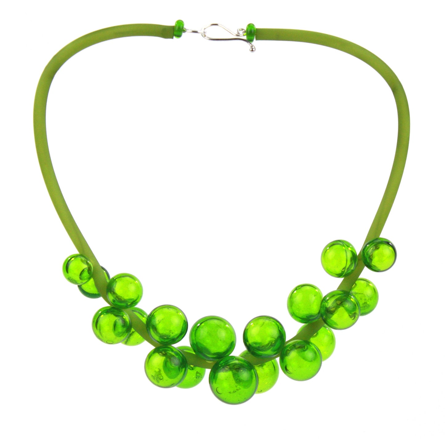 A vibrant green Chroma necklace featuring clustered handblown glass beads strung on steel wire and threaded through a green hand-dyed silicone cord with a sterling silver clasp.