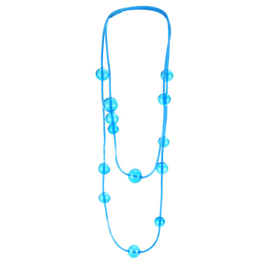 Orbit Necklace in Aqua featuring handblown glass beads on a hand-dyed silicone cord. Adjustable design allows for long or layered styling options.
