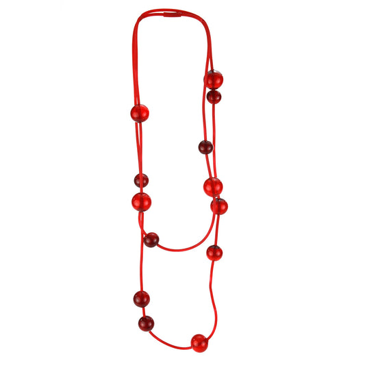 Orbit Necklace in vibrant red with handblown glass beads strung on a hand-dyed silicone cord. Versatile design for long or layered wear.