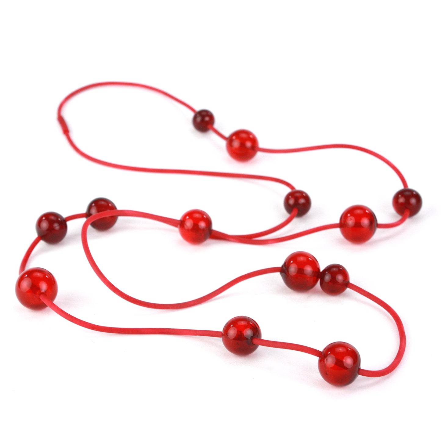 Orbit Necklace in vibrant red with handblown glass beads strung on a hand-dyed silicone cord. Versatile design for long or layered wear.