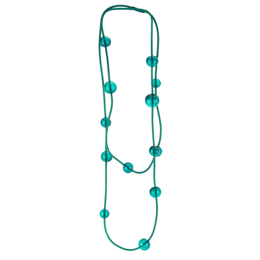 Teal Orbit Necklace featuring handblown glass beads on a hand-dyed silicone cord. Adjustable bead placement and versatile styling options.