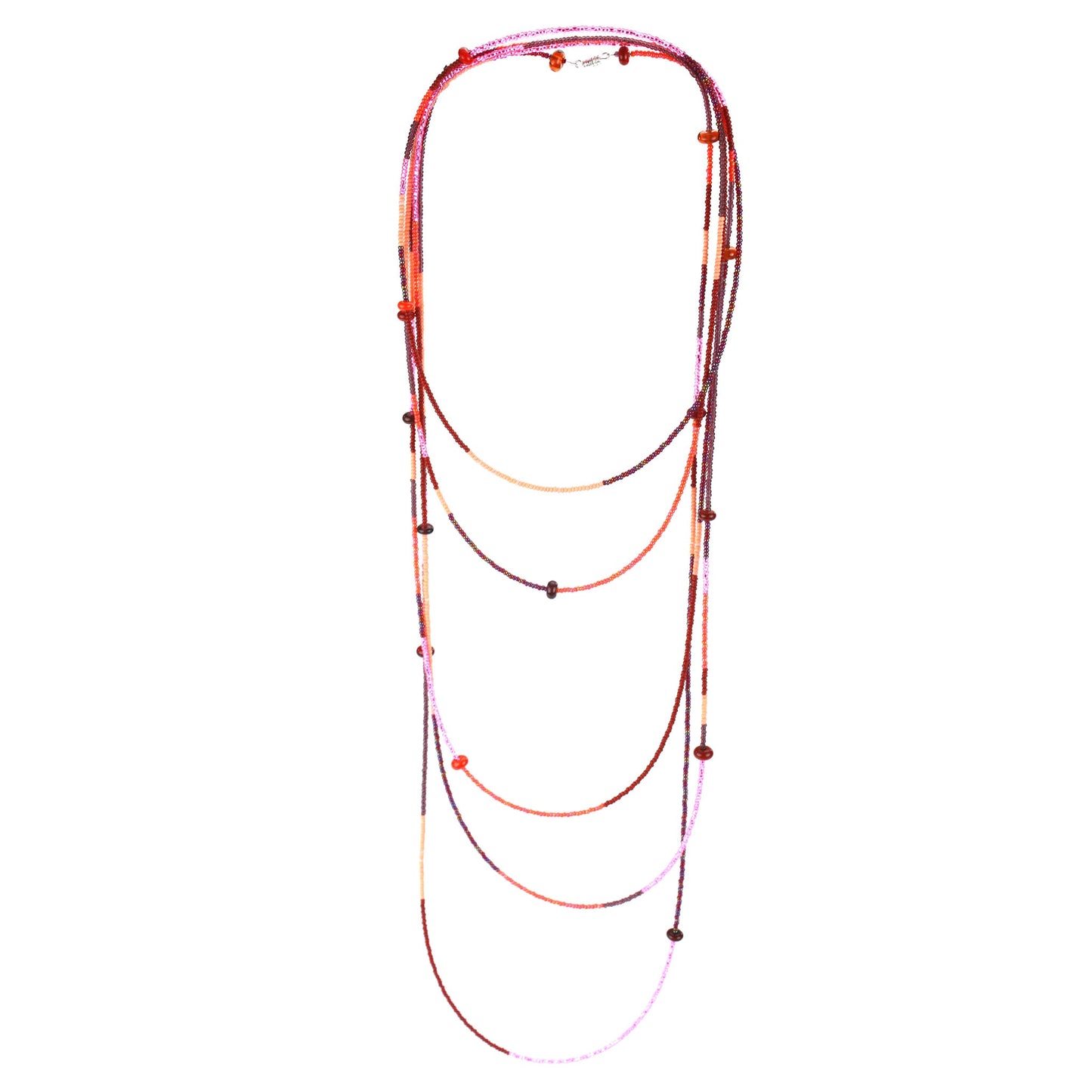 A 12-foot necklace featuring tiny glass seed beads in warm shades of red, orange, and pink, accented with handcrafted lampworked beads. The necklace includes a secure barrel screw clasp and can be styled as a layered necklace or wrapped around the wrist as a bracelet.