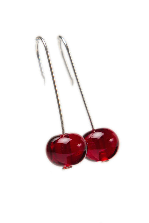 Ruby red handmade glass bubble bead earrings with sterling silver hooks. Lightweight, with 0.5-inch beads and a 1.25-inch length.