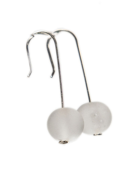 Frosted white handmade glass bubble bead earrings with sterling silver hooks. Beads are approximately 0.5 inches in diameter and 1.25 inches long.