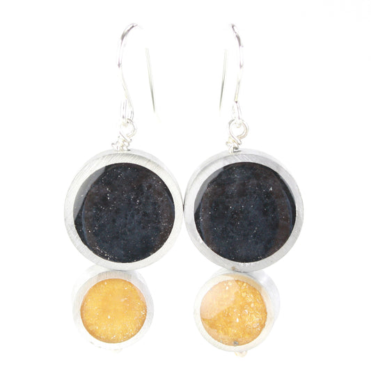 Resinique Double Circle Earrings featuring dark and golden eco-resin discs set in salvaged aluminum, with sterling silver ear wires for an elegant and sustainable look.