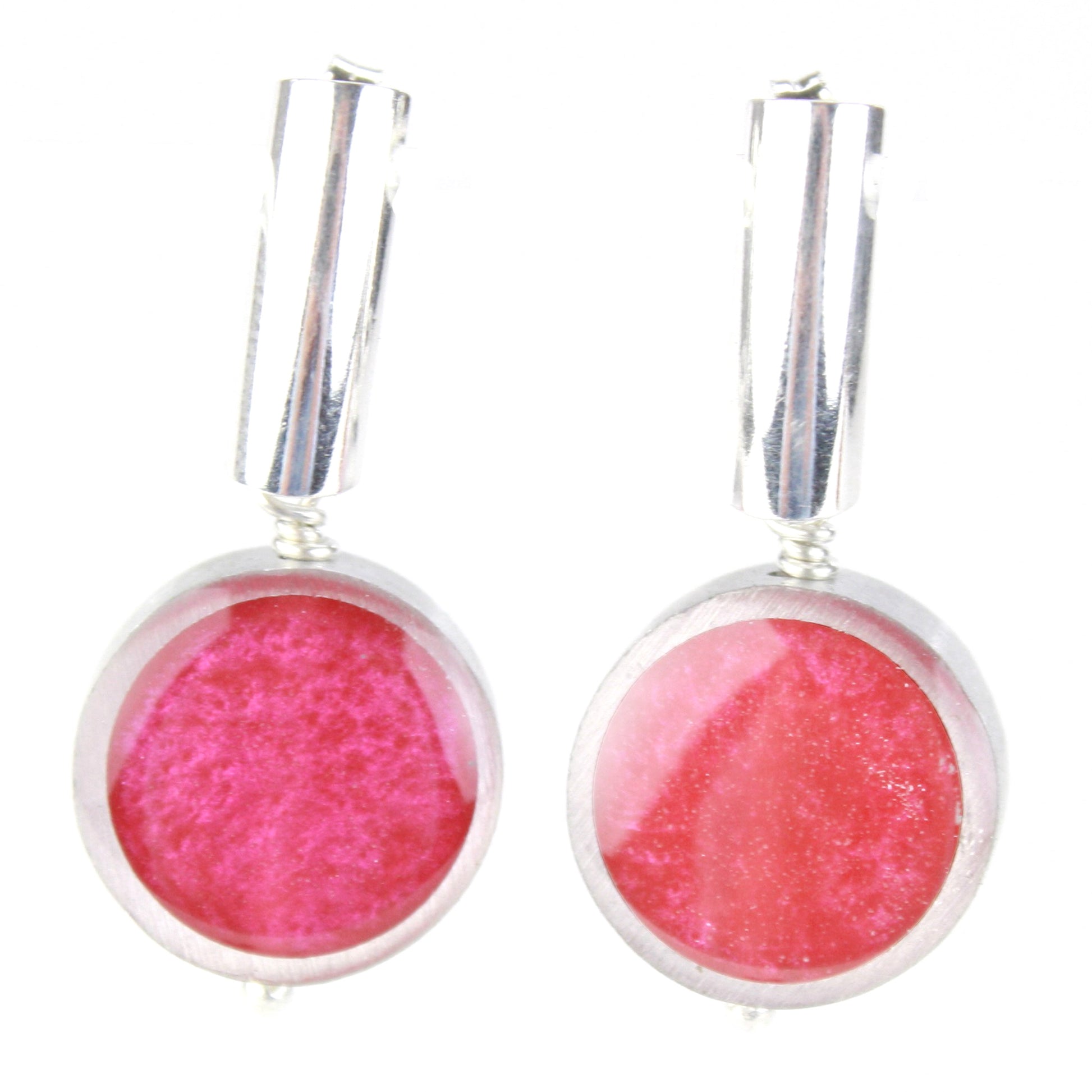 Bright pink eco-resin and salvaged aluminum drop earrings with matte finish, suspended from sterling silver ear wires.

