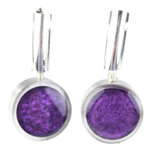 Deep purple eco-resin and salvaged aluminum drop earrings with a matte finish, hanging from sterling silver ear wires.