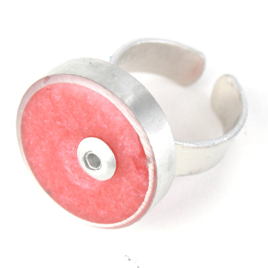 Light pink Resinique Single Circle Ring with a soft eco-resin centerpiece set in salvaged aluminum. Adjustable band for a customizable fit.