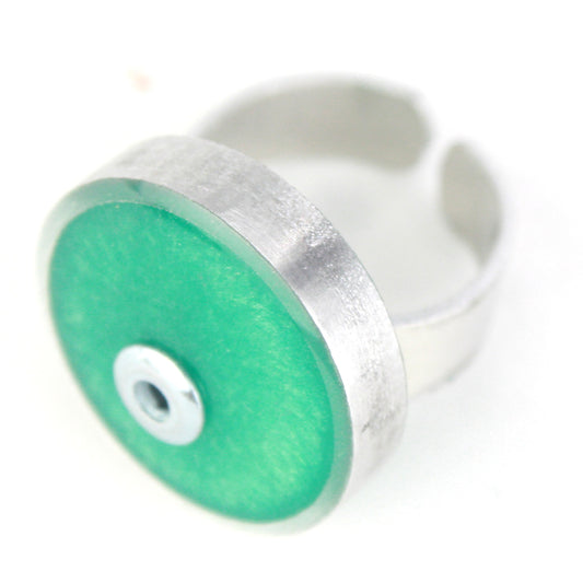 Seafoam Resinique Single Circle Ring with a soft green eco-resin centerpiece encased in salvaged aluminum and an adjustable band.