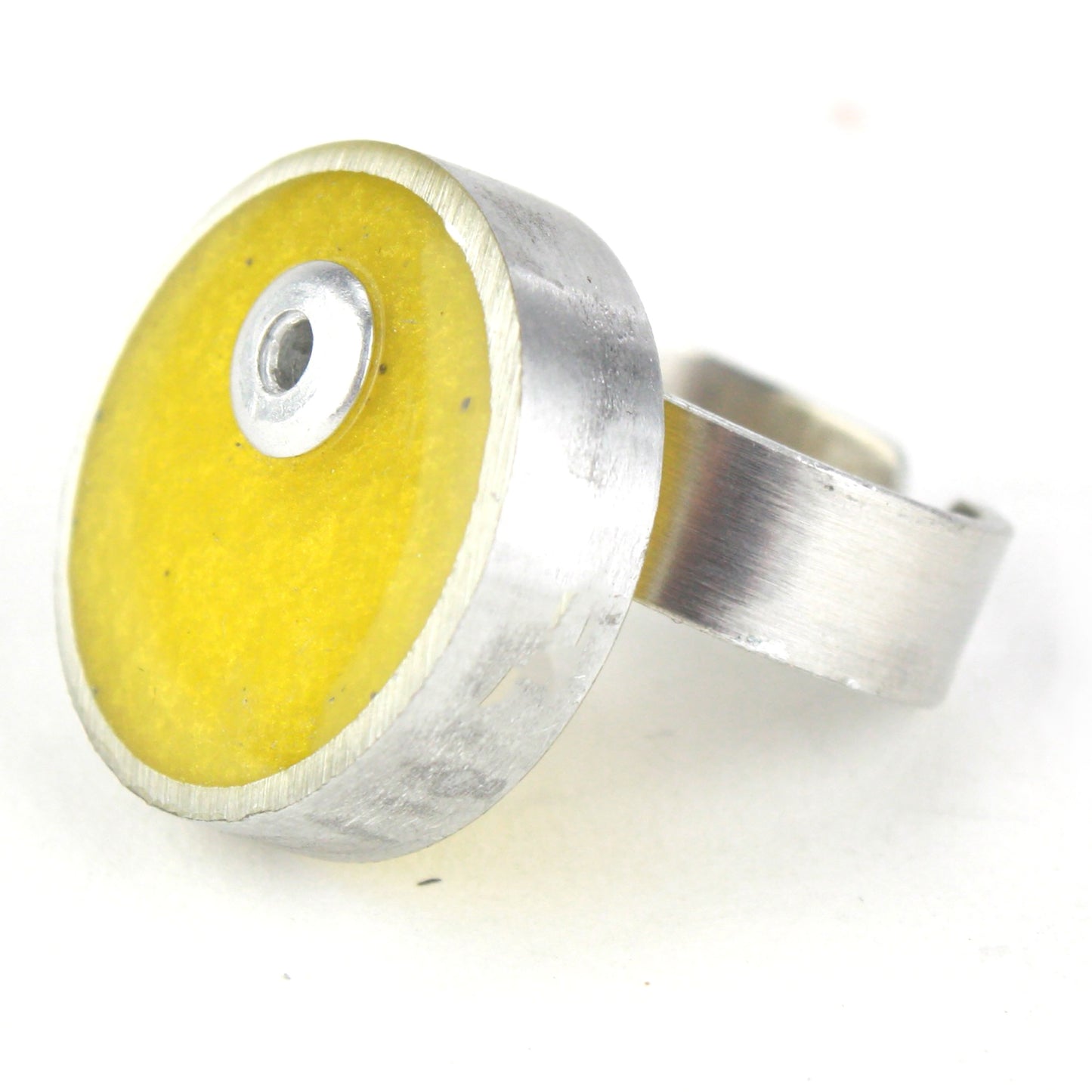 Yellow Resinique Single Circle Ring with a vibrant eco-resin centerpiece set in salvaged aluminum and an adjustable band.