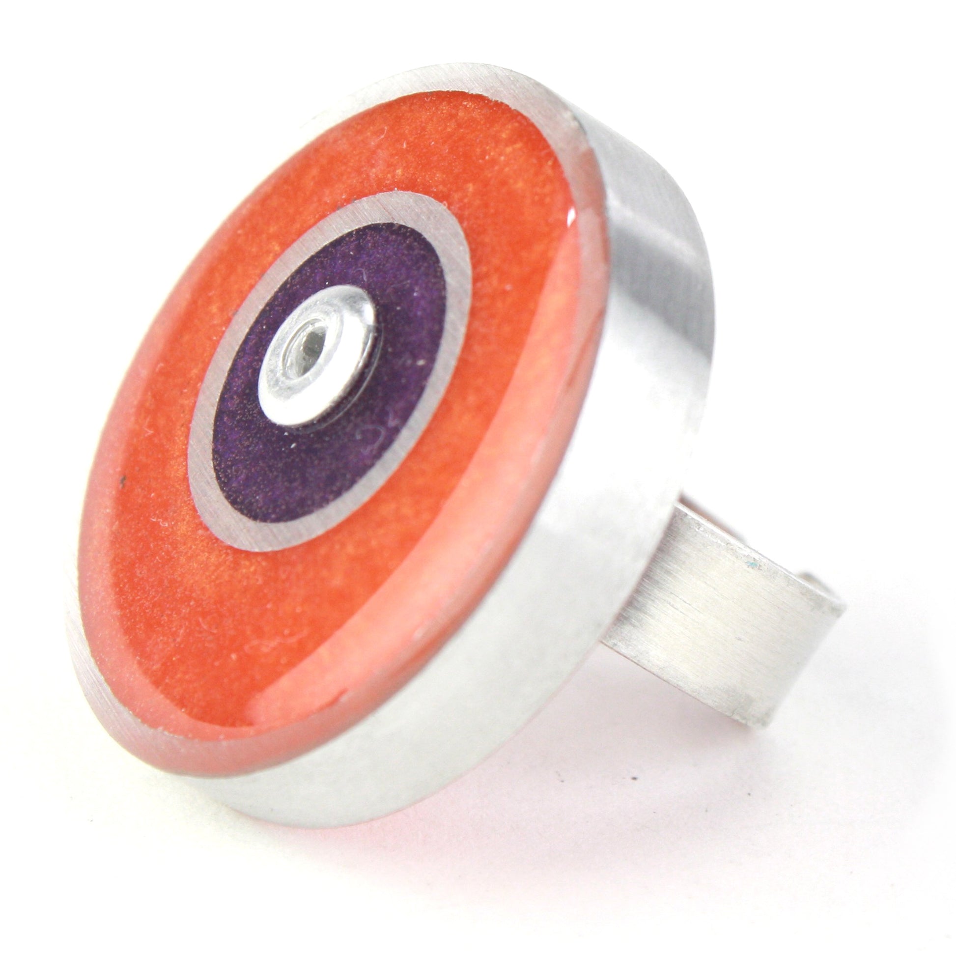 Orange and purple Resinique Double Circle Ring made from eco-resin and salvaged aluminum, featuring an adjustable band for a unique and sustainable accessory.