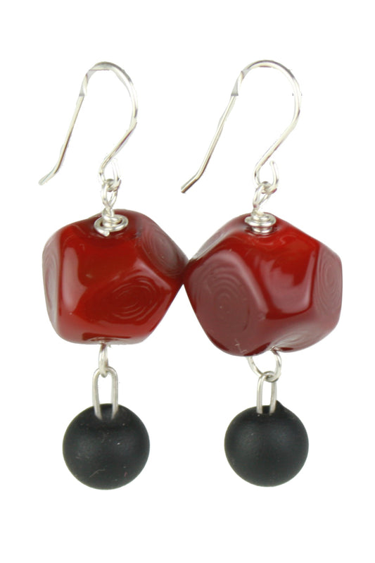 Nugget earrings featuring hand crafted red glass hand faceted beads with a black white glass charm