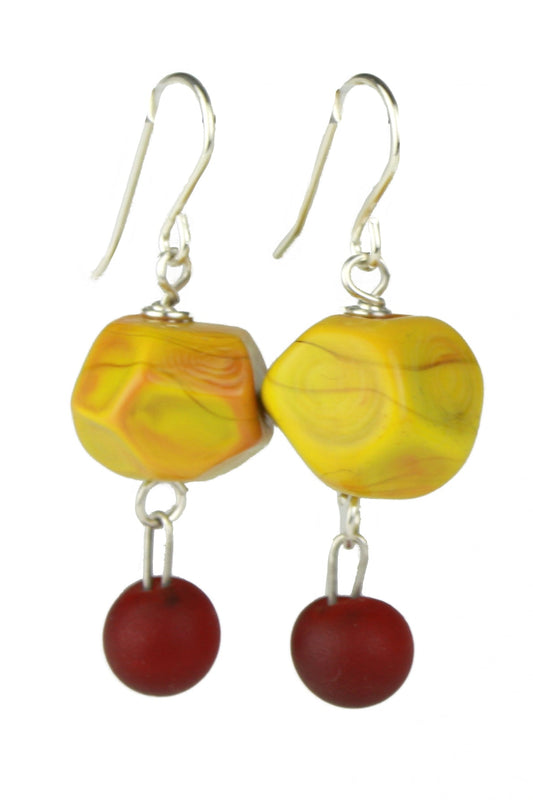 Nugget earrings featuring hand crafted ochre yellow glass hand faceted beads with a small deep red glass charm