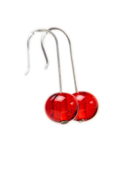 Handmade cherry red glass beads hung on long sterling silver ear wires.