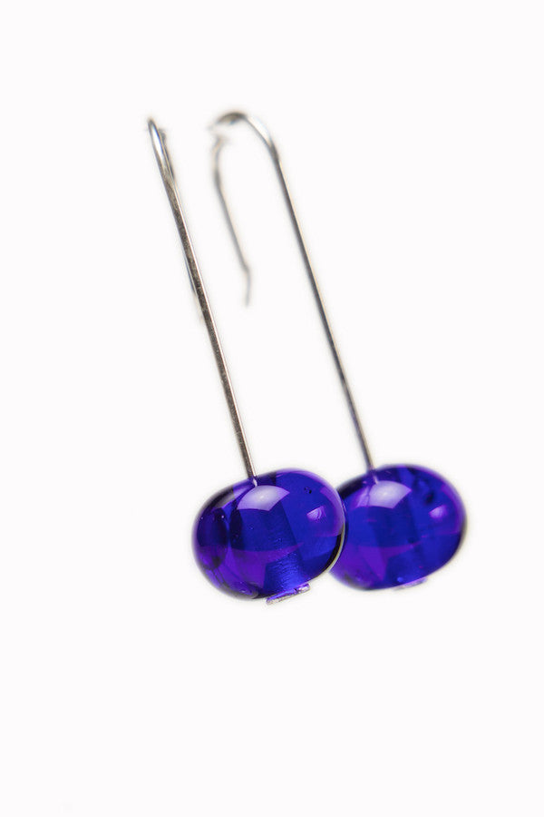 Handmade cobalt blue glass beads hung on sterling silver long ear wires.